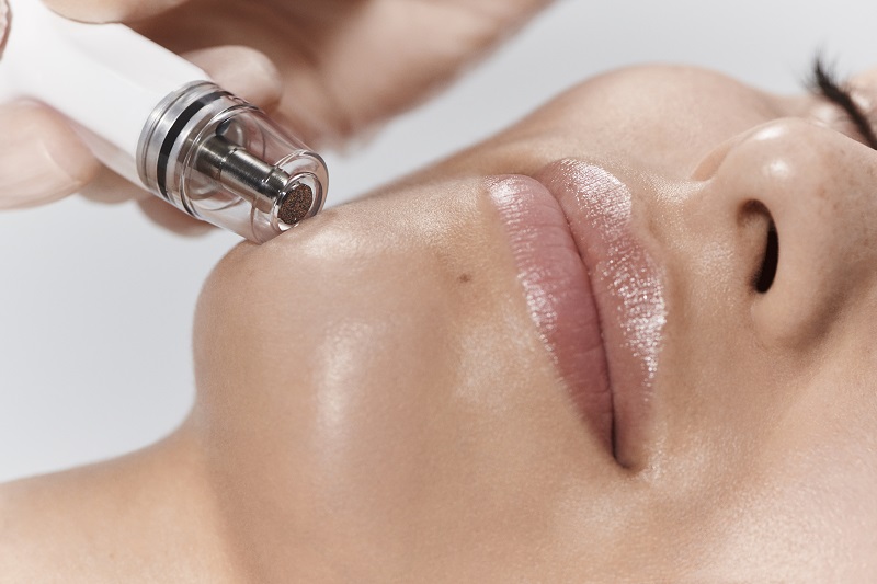 Woman getting a DiamondGlow treatment.